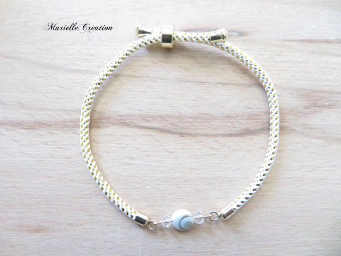 Bracelet réglable cordon blanc cassé, Œil de Sainte Lucie et perles cristal 
